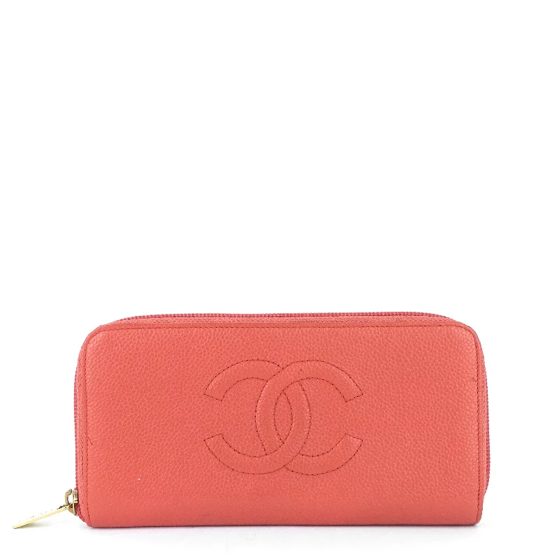 Chanel bags with gold, silver, and pearl accentsCC Timeless Caviar Zip Around Wallet