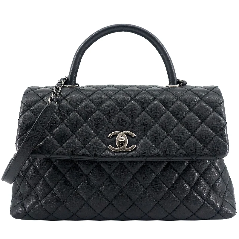 Chanel bags with iconic stitching detailsCoco Top Handle Medium Caviar Leather Bag