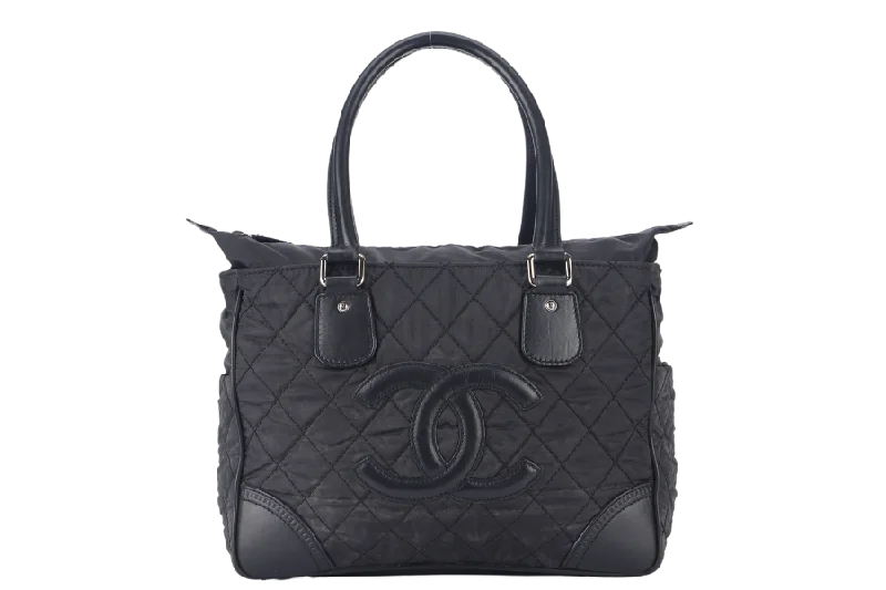 Chanel bags with the perfect balance of luxury and functionalityCHANEL PARIS NEW YORK TOTE BAG (1082xxxx) BLACK NYLON SILVER HARDWARE WITH CARD