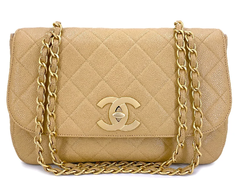 Chanel bags with gold, silver, and pearl accentsChanel Vintage Beige Curved Caviar Jumbo Flap Bag 24k GHW Classic 2001 MQV