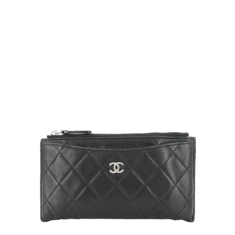 Chanel bags available at online luxury retaileClassic Zip Lambskin Leather Pouch