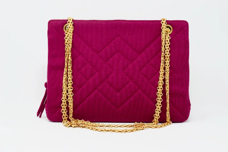 Chanel bags with intricate metal hardwareON LAYAWAY  Vintage 90's CHANEL Magenta Jersey Bag