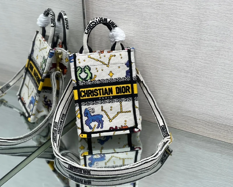 Christian Dior bags with a side - pocket for holding a water bottleChristian Dior Mini Book Tote Phone Bag