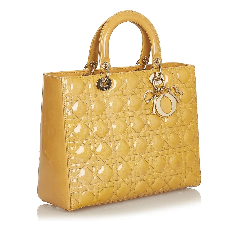 Christian Dior Saddle bags with a studded trim for a bold lookDior Cannage Lady Dior Patent Leather Tote (25997)