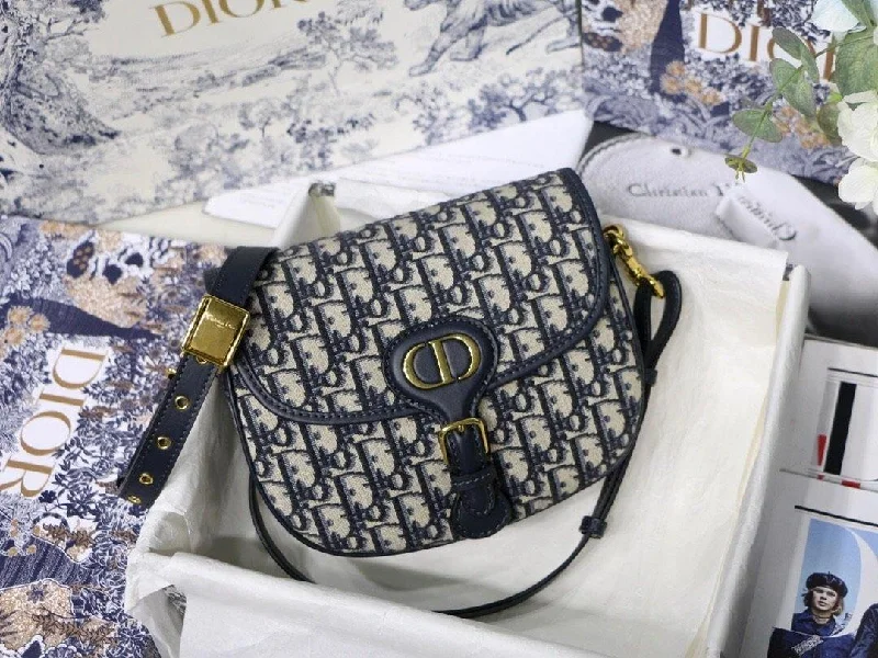 Christian Dior tote bags with a printed Dior logo on the frontChristian Dior Medium Bobby Bag